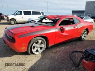 ✅ 2009 Dodge Challenger SE • VIN: 2B3LJ44VX9H600218 • Lot: 69623315. Listed on Copart with 245,383 mi. Free auction sales archive from the USA and detailed vehicle history report at DreamBid. Image 1.
