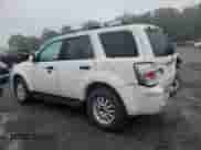 2010 Mercury Mariner Premier с VIN 4M2CN9HG1AKJ28171, выставлен на аукционе Copart как лот 80882805 с пробегом 124 347 миль миль и Списание • Salvage title. История ставок и продаж доступна на DreamBid. Изображение 2.