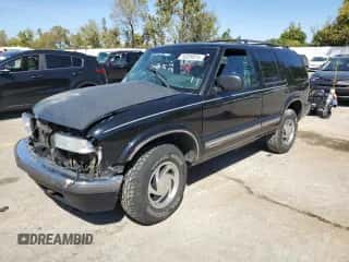 2001 Chevrolet Blazer LT with VIN 1GNDT13W112182576, listed as a Copart auction lot 74328974 with 117,751 mi miles and Salvage title. Bid and sale history available at DreamBid. Image 1.