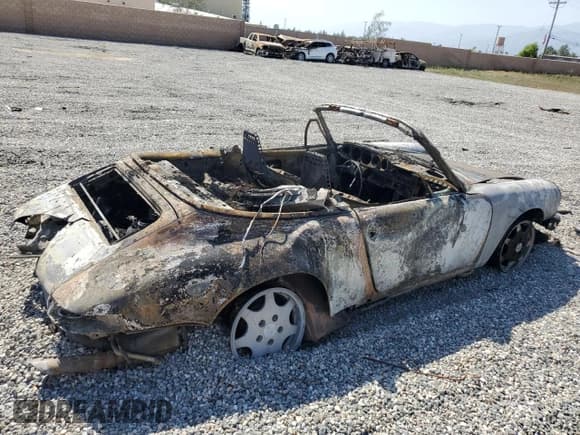 ✅ 1990 Porsche 911 • VIN: WP0CB2967LS471274 • Лот: 60897775. Опубликован ранее на Copart с пробегом Не указан. Бесплатный доступ к архиву аукционных продаж из США и подробный отчёт об истории автомобиля на DreamBid. Изображение 3.