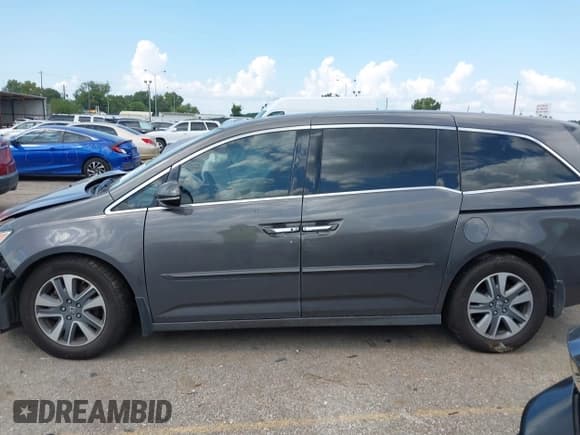 ✅ 2016 Honda Odyssey Touring Elite • VIN: 5FNRL5H9XGB156203 • Лот: 43133629. Опубликован ранее на IAAI с пробегом 115 695 миль. Бесплатный доступ к архиву аукционных продаж из США и подробный отчёт об истории автомобиля на DreamBid. Изображение 14.