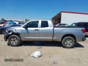 ✅ 2013 Toyota Tundra • VIN: 5TFRM5F16DX063979 • Lot: 42236653. Listed on IAAI with 305,960 mi. Free auction sales archive from the USA and detailed vehicle history report at DreamBid. Image 15.
