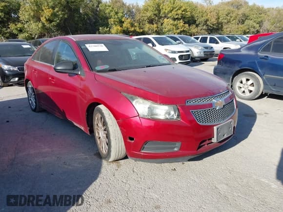 ✅ 2014 Chevrolet Cruze 1LT • VIN: 1G1PC5SB8E7306629 • Lot: 43700578. Listed on IAAI with 165,542 mi. Free auction sales archive from the USA and detailed vehicle history report at DreamBid. Image 1.