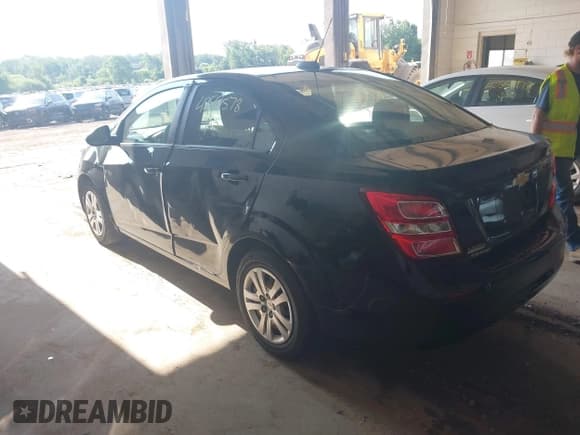 ✅ 2017 Chevrolet Sonic LS • VIN: 1G1JB5SG5H4124641 • Lot: 42551578. Listed on IAAI with 107,431 mi. Free auction sales archive from the USA and detailed vehicle history report at DreamBid. Image 3.