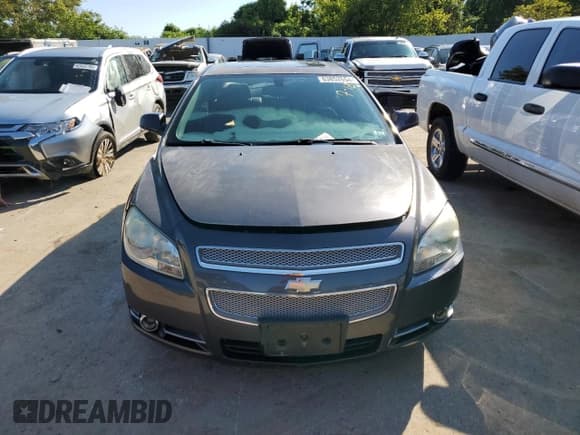 ✅ 2010 Chevrolet Malibu LTZ • VIN: 1G1ZE5E72A4116931 • Lot: 63852654. Listed on Copart with 175,134 mi. Free auction sales archive from the USA and detailed vehicle history report at DreamBid. Image 5.