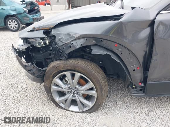 ✅ 2022 Mazda CX-30 S Carbon Edition • VIN: 3MVDMBCL2NM430767 • Lot: 43433804. Wystawiony na IAAI z przebiegiem 69 576 mil. Bezpłatny archiwum sprzedaży aukcyjnych z USA i szczegółowy raport historii pojazdu na DreamBid. Zdjęcie 19.