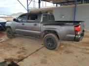 ✅ 2021 Toyota Tacoma SR • VIN: 5TFAX5GN4MX193510 • Лот: 86184305. Опубликован ранее на Copart с пробегом 92 950 миль. Бесплатный доступ к архиву аукционных продаж из США и подробный отчёт об истории автомобиля на DreamBid. Изображение 2.