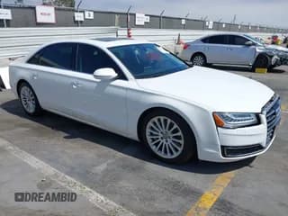 ✅ 2015 Audi A8 4.0T • VIN: WAU32AFD0FN007028 • Lot: 42719029. Wystawiony na IAAI z przebiegiem 75 203 mil. Bezpłatny archiwum sprzedaży aukcyjnych z USA i szczegółowy raport historii pojazdu na DreamBid. Zdjęcie 1.