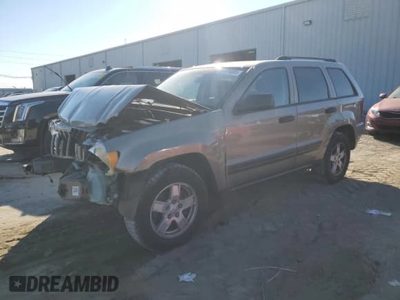 ✅ 2005 Jeep Grand Cherokee Laredo • VIN: 1J4GR48K85C629829 • Lot: 91171065. Listed on Copart with 128,643 mi. Free auction sales archive from the USA and detailed vehicle history report at DreamBid. Image 1.
