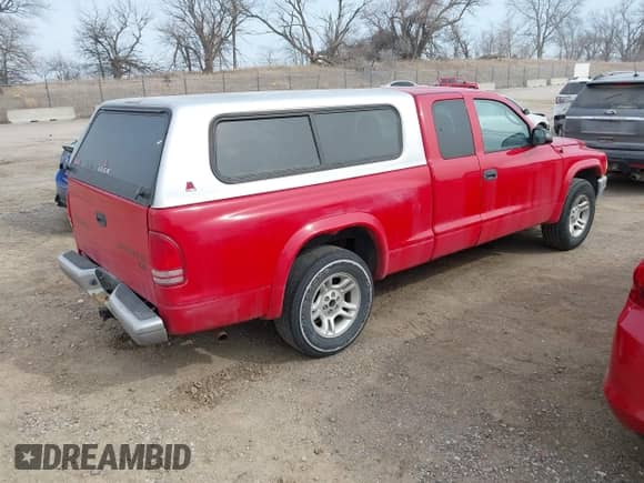 2003 Dodge Dakota SLT with VIN 1D7HL42X43S247404, listed as a IAAI auction lot 41685036 with 95,054 mi miles and . Bid and sale history available at DreamBid. Image 4.