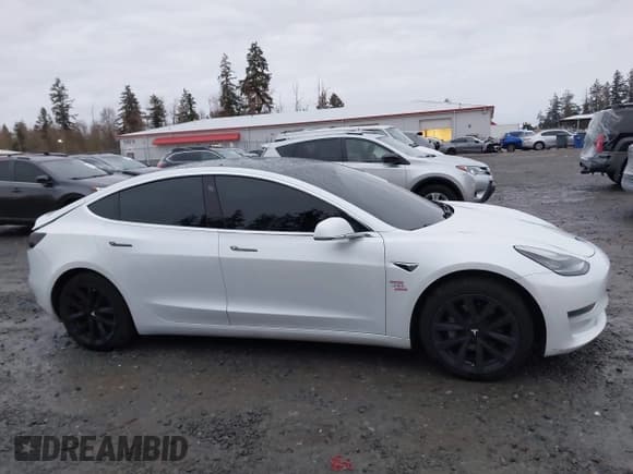 ✅ 2020 Tesla Model 3 Standard Range Plus • VIN: 5YJ3E1EA7LF799447 • Лот: 43752660. Опубликован ранее на IAAI с пробегом 63 864 миль. Бесплатный доступ к архиву аукционных продаж из США и подробный отчёт об истории автомобиля на DreamBid. Изображение 14.
