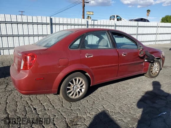 ✅ 2005 Suzuki Forenza LX • VIN: KL5JJ56Z65K093127 • Lot: 87691665. Wystawiony na Copart z przebiegiem 178 868 mil. Bezpłatny archiwum sprzedaży aukcyjnych z USA i szczegółowy raport historii pojazdu na DreamBid. Zdjęcie 3.