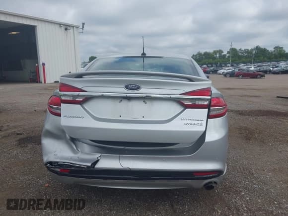 ✅ 2017 Ford Fusion Hybrid Titanium • VIN: 3FA6P0RU3HR188204 • Лот: 42618604. Опубликован ранее на IAAI с пробегом 104 609 миль. Бесплатный доступ к архиву аукционных продаж из США и подробный отчёт об истории автомобиля на DreamBid. Изображение 16.