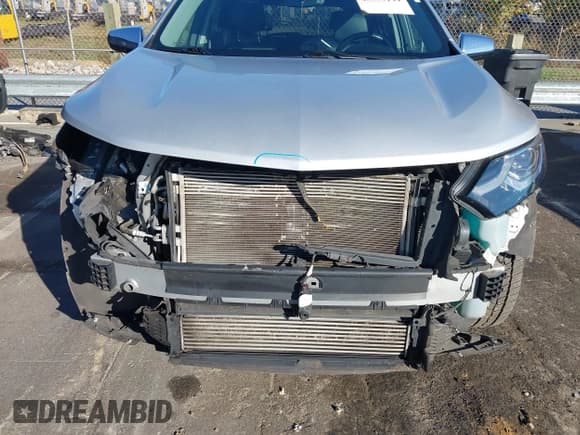 ✅ 2018 Chevrolet Equinox Premier • VIN: 2GNAXVEV6J6312308 • Лот: 43537199. Опубликован ранее на IAAI с пробегом 169 894 миль. Бесплатный доступ к архиву аукционных продаж из США и подробный отчёт об истории автомобиля на DreamBid. Изображение 6.