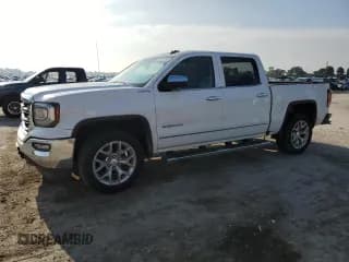 ✅ 2018 GMC Sierra 1500 SLT • VIN: 3GTU2NEC9JG116922 • Lot: 58913285. Listed on Copart with 141,189 mi. Free auction sales archive from the USA and detailed vehicle history report at DreamBid. Image 1.