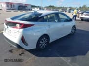 ✅ 2021 Toyota Prius XLE • VIN: JTDKAMFP2M3181138 • Lot: 43818185. Listed on IAAI with 103,925 mi. Free auction sales archive from the USA and detailed vehicle history report at DreamBid. Image 4.