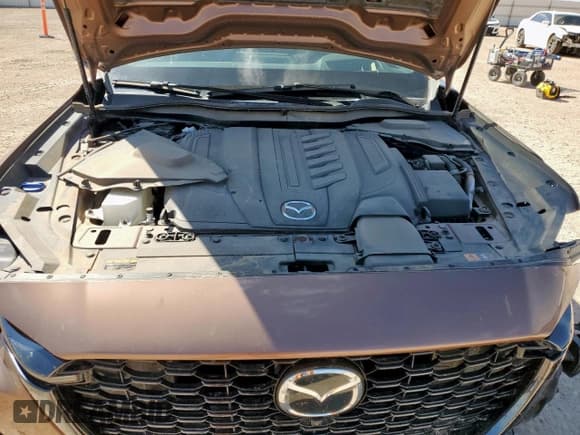 ✅ 2025 Mazda CX-70 S Premium • VIN: JM3KJDHC2S1108958 • Лот: 86287255. Опубликован ранее на Copart с пробегом 20 733 миль. Бесплатный доступ к архиву аукционных продаж из США и подробный отчёт об истории автомобиля на DreamBid. Изображение 12.