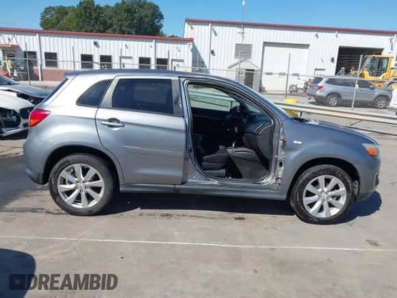 2015 Mitsubishi Outlander ES with VIN 4A4AP3AUXFE051920, listed as a IAAI auction lot 43373956 with 98,591 mi miles and . Bid and sale history available at DreamBid. Image 14.
