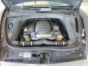 ✅ 2010 Porsche Cayenne • VIN: WP1AB2AP0ALA50336 • Lot: 62089865. Listed on Copart with 153,942 mi. Free auction sales archive from the USA and detailed vehicle history report at DreamBid. Image 12.