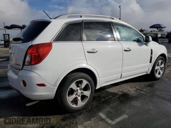 2014 Chevrolet Captiva Sport LTZ z VIN 3GNAL4EK3ES648727, wystawiony jako Copart lot #85587354 z przebiegiem 135 857 mil mil oraz Szkoda całkowita • Salvage title. Historia ofert i sprzedaży dostępna na DreamBid. Obrazek 3.
