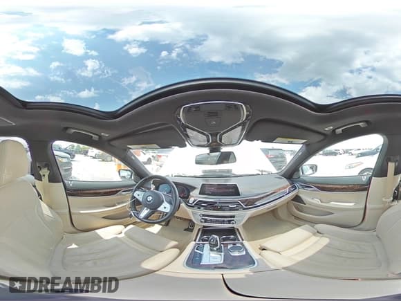 ✅ 2020 BMW 7 Series 740i xDrive • VIN: WBA7T4C0XLCD70397 • Лот: 66119165. Опубликован ранее на Copart с пробегом 50 215 миль. Бесплатный доступ к архиву аукционных продаж из США и подробный отчёт об истории автомобиля на DreamBid. Изображение 14.