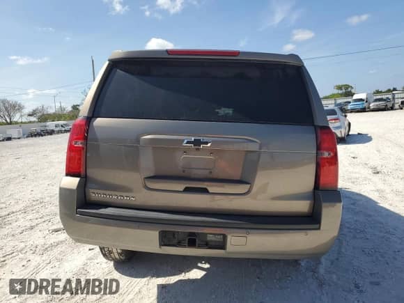 2018 Chevrolet Suburban LS с VIN 1GNSCGKC6JR249746, выставлен на аукционе Copart как лот 55622105 с пробегом 126 378 миль миль и Списание • Salvage title. История ставок и продаж доступна на DreamBid. Изображение 6.