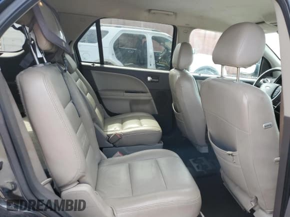 ✅ 2009 Ford Taurus X SEL • VIN: 1FMDK02W29GA03382 • Лот: 92851615. Опубликован ранее на Copart с пробегом 254 549 миль. Бесплатный доступ к архиву аукционных продаж из США и подробный отчёт об истории автомобиля на DreamBid. Изображение 11.