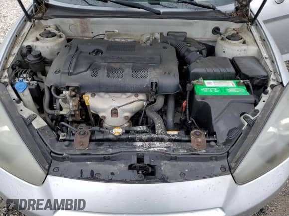 2008 Hyundai Tiburon GS с VIN KMHHM66D68U288062, выставлен на аукционе Copart как лот 58261695 с пробегом 130 310 миль миль и Чистый • Clean title. История ставок и продаж доступна на DreamBid. Изображение 11.