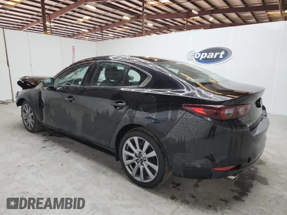 ✅ 2025 Mazda 3 S Preferred • VIN: 3MZBPACM1SM457888 • Лот: 86996495. Опубликован ранее на Copart с пробегом 16 959 миль. Бесплатный доступ к архиву аукционных продаж из США и подробный отчёт об истории автомобиля на DreamBid. Изображение 2.
