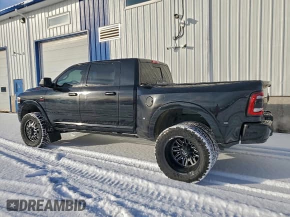 ✅ 2022 Ram 3500 Laramie • VIN: 3C63RRML1NG211777 • Lot: 94038035. Listed on Copart with 74,067 mi. Free auction sales archive from the USA and detailed vehicle history report at DreamBid. Image 2.