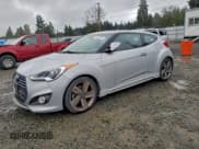 ✅ 2013 Hyundai Veloster Turbo • VIN: KMHTC6AE8DU083107 • Lot: 93522185. Listed on Copart with 114,998 mi. Free auction sales archive from the USA and detailed vehicle history report at DreamBid. Image 1.