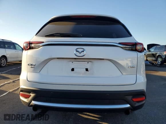 ✅ 2019 Mazda CX-9 Grand Touring • VIN: JM3TCBDY5K0334079 • Lot: 91320745. Listed on Copart with 95,598 mi. Free auction sales archive from the USA and detailed vehicle history report at DreamBid. Image 6.