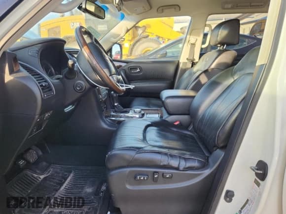 ✅ 2014 Infiniti QX80 • VIN: JN8AZ2NE1E9064551 • Lot: 92340305. Wystawiony na Copart z przebiegiem 198 171 mil. Bezpłatny archiwum sprzedaży aukcyjnych z USA i szczegółowy raport historii pojazdu na DreamBid. Zdjęcie 7.