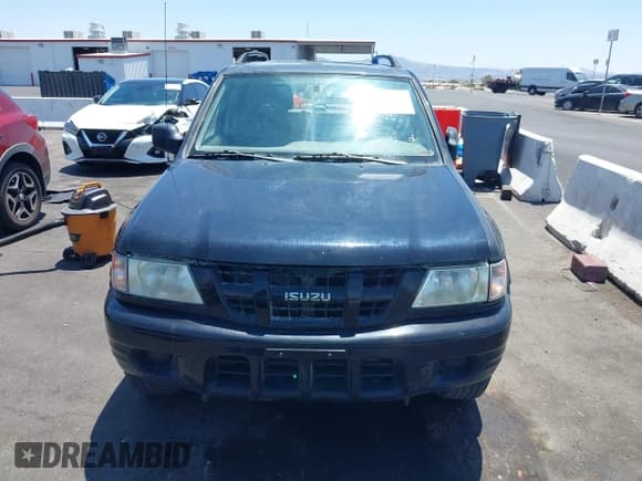 ✅ 2004 Isuzu Rodeo S • VIN: 4S2CK58YX44311680 • Lot: 42476361. Listed on IAAI with 154,693 mi. Free auction sales archive from the USA and detailed vehicle history report at DreamBid. Image 12.