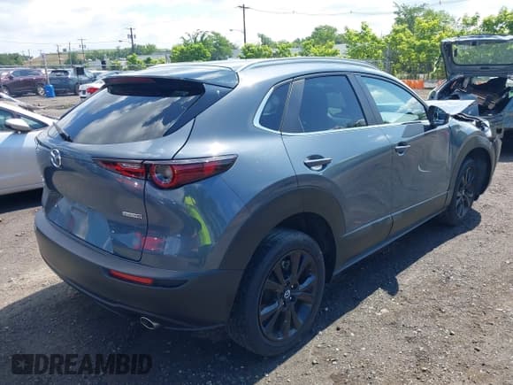 ✅ 2022 Mazda CX-30 S Carbon Edition • VIN: 3MVDMBCL9NM429826 • Lot: 42680808. Listed on IAAI with 28,234 mi. Free auction sales archive from the USA and detailed vehicle history report at DreamBid. Image 4.