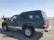 2001 Dodge Dakota Sport z VIN 1B7GG26N81S262671, wystawiony jako Copart lot #71080995 z przebiegiem 145 480 mil mil oraz Szkoda całkowita • Salvage title. Historia ofert i sprzedaży dostępna na DreamBid. Obrazek 2.