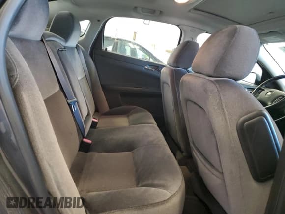 ✅ 2014 Chevrolet Impala LT • VIN: 2G1WB5E39E1100977 • Лот: 75758804. Опубликован ранее на Copart с пробегом 143 831 миль. Бесплатный доступ к архиву аукционных продаж из США и подробный отчёт об истории автомобиля на DreamBid. Изображение 10.