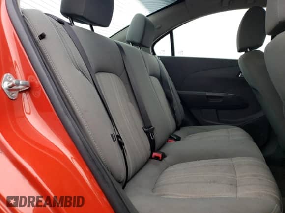 2012 Chevrolet Sonic LT z VIN 1G1JC5SH3C4171861, wystawiony jako Copart lot #71653174 z przebiegiem 169 648 mil mil oraz Szkoda całkowita • Salvage title. Historia ofert i sprzedaży dostępna na DreamBid. Obrazek 11.