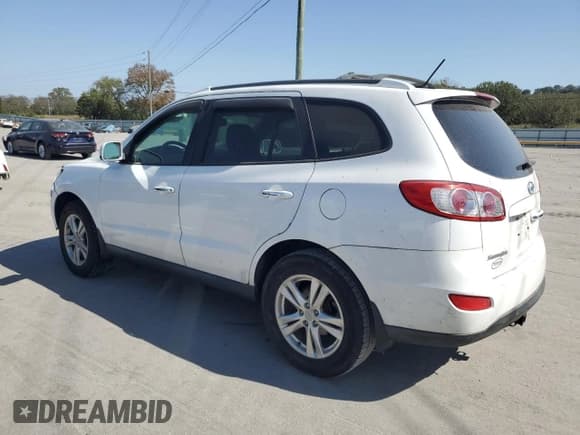 ✅ 2012 Hyundai Santa Fe Limited • VIN: 5XYZK4AG0CG144702 • Lot: 75204044. Listed on Copart with 173,296 mi. Free auction sales archive from the USA and detailed vehicle history report at DreamBid. Image 2.