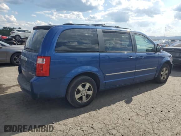 ✅ 2010 Dodge Grand Caravan SXT • VIN: 2D4RN5D19AR489601 • Лот: 70629315. Опубликован ранее на Copart с пробегом 242 179 миль. Бесплатный доступ к архиву аукционных продаж из США и подробный отчёт об истории автомобиля на DreamBid. Изображение 3.