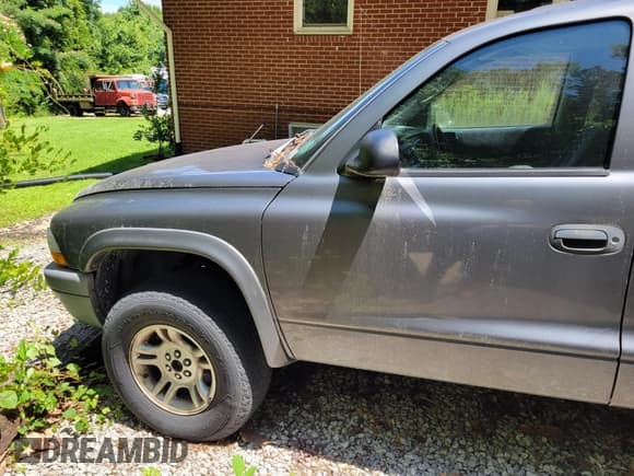 ✅ 2004 Dodge Dakota Sport • VIN: 1D7HG38K74S685426 • Lot: 42567316. Wystawiony na IAAI z przebiegiem 187 325 mil. Bezpłatny archiwum sprzedaży aukcyjnych z USA i szczegółowy raport historii pojazdu na DreamBid. Zdjęcie 3.