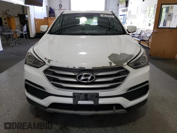 ✅ 2018 Hyundai Santa Fe 2.4L • VIN: 5NMZT3LB2JH088838 • Lot: 57902485. Listed on Copart with 118,294 mi. Free auction sales archive from the USA and detailed vehicle history report at DreamBid. Image 5.