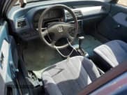 ✅ 1991 Honda Civic DX • VIN: 1HGED364XML052697 • Lot: 78775474. Wystawiony na Copart z przebiegiem 650 755 mil. Bezpłatny archiwum sprzedaży aukcyjnych z USA i szczegółowy raport historii pojazdu na DreamBid. Zdjęcie 8.