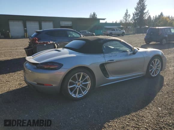 ✅ 2018 Porsche 718 Boxster • VIN: WP0CA2A81JS210302 • Лот: 80034585. Опубликован ранее на Copart с пробегом Не указан. Бесплатный доступ к архиву аукционных продаж из США и подробный отчёт об истории автомобиля на DreamBid. Изображение 3.