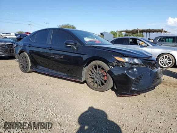 ✅ 2021 Toyota Camry TRD • VIN: 4T1KZ1AK5MU048687 • Lot: 82611425. Listed on Copart with 125,298 mi. Free auction sales archive from the USA and detailed vehicle history report at DreamBid. Image 4.
