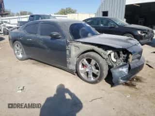 2008 Dodge Charger SRT-8 с VIN 2B3LA73W98H284093, выставлен на аукционе Copart как лот 75829024 с пробегом 148 795 миль миль и Списание • Salvage title. История ставок и продаж доступна на DreamBid. Изображение 4.