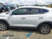 ✅ 2019 Hyundai Tucson SE • VIN: KM8J2CA4XKU892685 • Лот: 43179204. Опубликован ранее на IAAI с пробегом 106 612 миль. Бесплатный доступ к архиву аукционных продаж из США и подробный отчёт об истории автомобиля на DreamBid. Изображение 14.