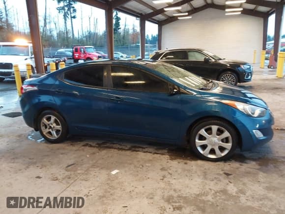 ✅ 2013 Hyundai Elantra Limited • VIN: KMHDH4AE9DU961394 • Лот: 43594484. Опубликован ранее на IAAI с пробегом 200 479 миль. Бесплатный доступ к архиву аукционных продаж из США и подробный отчёт об истории автомобиля на DreamBid. Изображение 13.