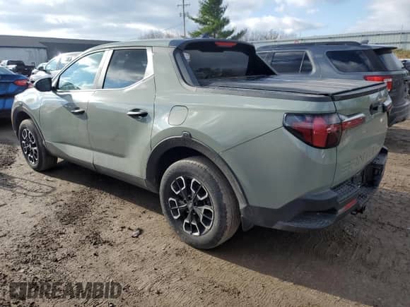 2023 Hyundai Santa Cruz SEL z VIN 5NTJBDAE5PH075498, wystawiony jako Copart lot #81267264 z przebiegiem 23 989 mil mil oraz Czysty tytuł • Clean title. Historia ofert i sprzedaży dostępna na DreamBid. Obrazek 2.