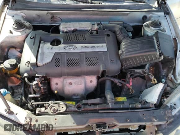 2003 Hyundai Elantra GLS z VIN KMHDN45D33U536214, wystawiony jako Copart lot #81979704 z przebiegiem 157 515 mil mil oraz Szkoda całkowita • Salvage title. Historia ofert i sprzedaży dostępna na DreamBid. Obrazek 11.